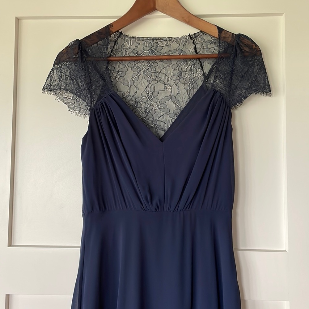 ASOS formal navy gown with lace cap sleeves.